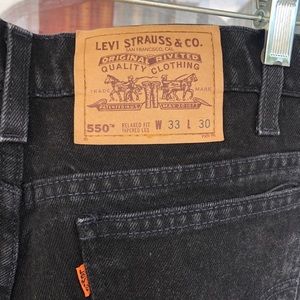 Vintage orange tab Levi’s 550 relaxed fit.